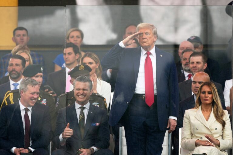 Military parade barrels through DC as ‘No Kings’ protesters across US decry Trump