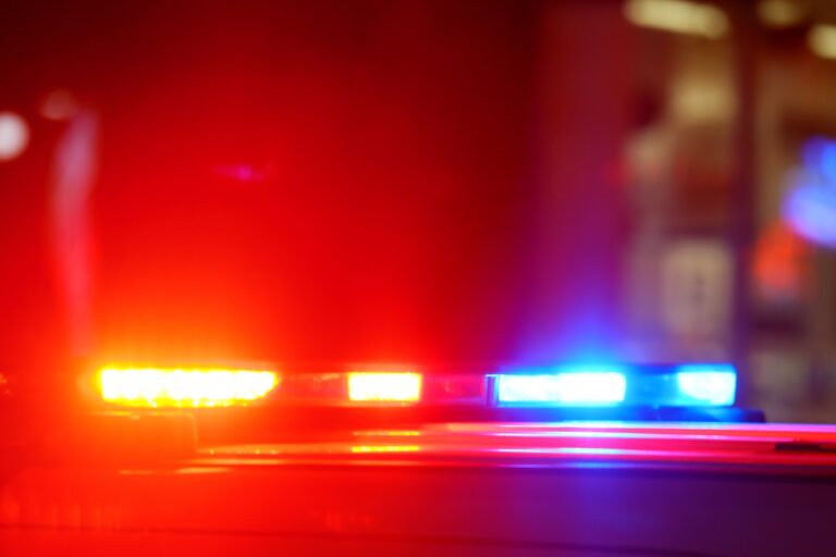 Person dies in Auburn after car overturns, crashes in body of water