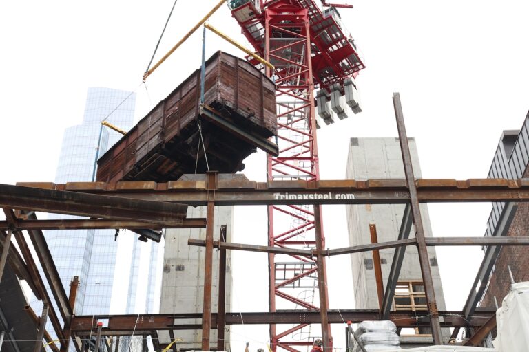 Holocaust Museum Boston moves historic railcar into construction position overlooking Boston Common